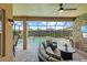 Enjoy serene outdoor living on the covered patio with pool views at 31382 Chesapeake Bay Dr, Wesley Chapel, FL 33543