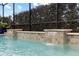 Pool featuring a waterfall feature flowing into crystal clear blue water at 31382 Chesapeake Bay Dr, Wesley Chapel, FL 33543