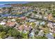 Waterfront property with access to the Gulf of Mexico, lush landscaping and a private backyard pool at 314 Crosswinds Dr, Palm Harbor, FL 34683