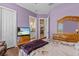 Bedroom with an ensuite bathroom and a hardwood floor at 314 Crosswinds Dr, Palm Harbor, FL 34683