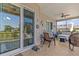 Enjoy the outdoors with this beautiful tiled, screened-in lanai and ceiling fans at 314 Crosswinds Dr, Palm Harbor, FL 34683