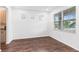 Bright and airy flex room with hardwood floors and ample natural light, ideal for various uses at 33263 Sycamore Leaf Dr, Wesley Chapel, FL 33545
