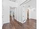 Spacious foyer with hardwood flooring and ample natural light, offering a grand entrance at 33263 Sycamore Leaf Dr, Wesley Chapel, FL 33545