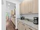 Kitchen featuring granite countertops, stainless steel appliances, and wood flooring at 33263 Sycamore Leaf Dr, Wesley Chapel, FL 33545