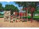 Explore the community playground complete with slides, climbing wall, and other fun playground equipment at 34516 Heavenly Ln, Dade City, FL 33525