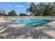Well-maintained swimming pool with a clear blue water and surrounding lounge chairs for relaxation at 34516 Heavenly Ln, Dade City, FL 33525