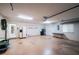Spacious garage with ample storage space and access to the home at 34527 Cedarfield Dr, Dade City, FL 33523