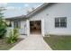 Garage exterior showing access with a partial view of the interior at 34527 Cedarfield Dr, Dade City, FL 33523