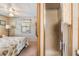 Bathroom with small shower stall off of the bedroom at 37025 Lois Ave, Zephyrhills, FL 33542