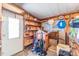 Storage shed with shelving and other storage items at 37025 Lois Ave, Zephyrhills, FL 33542
