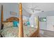 Light bedroom featuring wood-look floors, vaulted ceilings, and sunny bay window at 3819 Barnegat Dr, Punta Gorda, FL 33950