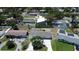 An aerial view shows the home's place in the community at 3841 Wahoo Se Dr, St Petersburg, FL 33705