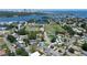 An aerial view shows the home's proximity to nearby urban parks, waterways, and the city skyline at 3841 Wahoo Se Dr, St Petersburg, FL 33705