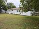 A spacious backyard, offering plenty of room for outdoor activities and landscaping possibilities at 3918 E Clifton St, Tampa, FL 33610