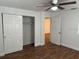 Bedroom featuring a closet and ceiling fan at 3918 E Clifton St, Tampa, FL 33610