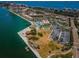 Aerial view showcasing community amenities, pristine waterfront, and lush landscaping at 4900 Brittany S Dr # 502, St Petersburg, FL 33715