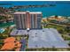 Aerial view of the high rise, waterfront and parking at 4900 Brittany S Dr # 502, St Petersburg, FL 33715