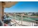 Relaxing balcony area with seating, perfect for enjoying tranquil water views at 4900 Brittany S Dr # 502, St Petersburg, FL 33715