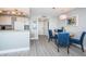 Cozy dining area with seating for four is conveniently located near the kitchen at 4900 Brittany S Dr # 502, St Petersburg, FL 33715
