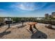 Community grill area with multiple grills and a table, close to the waterfront at 4900 Brittany S Dr # 502, St Petersburg, FL 33715