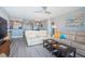 Spacious living room with an open floor plan to the kitchen and dining areas at 4900 Brittany S Dr # 502, St Petersburg, FL 33715