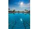 Beautiful community pool with steps and handrails offers a refreshing and accessible outdoor space at 4900 Brittany S Dr # 502, St Petersburg, FL 33715