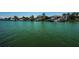 Expansive waterfront view with private boat docks, lush landscaping, and luxurious homes at 4900 Brittany S Dr # 502, St Petersburg, FL 33715