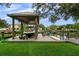 Waterfront boat dock featuring a boat lift and easy access to the water at 5018 S The Riviera St, Tampa, FL 33609