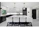 Stylish kitchen with a spacious island, modern lighting, and high-end appliances at 5018 S The Riviera St, Tampa, FL 33609
