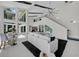Spacious living room boasts high ceilings, large windows, and a modern design with sleek furnishings at 5018 S The Riviera St, Tampa, FL 33609