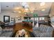 Luxurious clubhouse featuring comfortable seating, a pool table, and a convenient kitchenette for socializing at 5094 Starfish Se Dr # E, St Petersburg, FL 33705