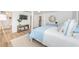Comfortable bedroom with wood flooring and a stylish color scheme at 5094 Starfish Se Dr # E, St Petersburg, FL 33705