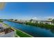 Scenic waterfront view of blue condos along a canal, perfect for boating and relaxing at 5094 Starfish Se Dr # E, St Petersburg, FL 33705