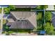 Aerial view of house roof with well-manicured yard at 5108 Suncatcher Dr, Wesley Chapel, FL 33545