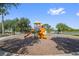 Outdoor playground with slides, climbing structures, and benches for relaxation at 5108 Suncatcher Dr, Wesley Chapel, FL 33545