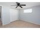 Bedroom with tile flooring, a closet and a ceiling fan at 5203 Overton Dr, New Port Richey, FL 34652