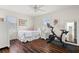 Cozy bedroom with hardwood floors, and bright, natural light at 6113 Kipps Colony W Dr, Gulfport, FL 33707