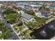 Stunning exterior view of a two-story home with a yard and waterfront access at 6113 Kipps Colony W Dr, Gulfport, FL 33707