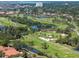 Breathtaking view of a golf course with ponds, sand traps, and lush greenery at 6113 Kipps Colony W Dr, Gulfport, FL 33707