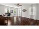Large office featuring wood floors, natural light, and custom accents throughout the space at 6113 Kipps Colony W Dr, Gulfport, FL 33707