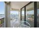 Large balcony offers seating with beautiful water views, a perfect spot for outdoor dining at 6322 Palma Del Mar S Blvd # 706, St Petersburg, FL 33715