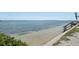 Direct beach access with convenient stairs leading to tranquil waters for leisure and enjoyment at 6322 Palma Del Mar S Blvd # 706, St Petersburg, FL 33715