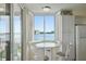 Bright breakfast nook with panoramic water views and shuttered windows for privacy at 6322 Palma Del Mar S Blvd # 706, St Petersburg, FL 33715