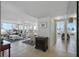 Open-concept living area with tile flooring, comfortable seating, and lots of natural light at 6322 Palma Del Mar S Blvd # 706, St Petersburg, FL 33715
