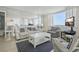Charming living room featuring comfortable seating, tile floors, and abundant natural light at 6322 Palma Del Mar S Blvd # 706, St Petersburg, FL 33715