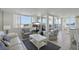 Well-lit living area with a stylish interior and views of the city skyline and water at 6322 Palma Del Mar S Blvd # 706, St Petersburg, FL 33715