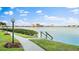 Scenic waterfront view with lush landscaping and a picturesque skyline in the distance at 6322 Palma Del Mar S Blvd # 706, St Petersburg, FL 33715