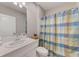 Bright bathroom featuring a vanity and toilet at 6333 Milestone Loop, Palmetto, FL 34221