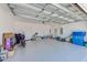 Spacious garage with ample storage and epoxy-coated floors provides parking at 6333 Milestone Loop, Palmetto, FL 34221