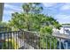 Enjoy the lush, green scenery with a view of trees from this comfortable balcony space in the community at 7070 Opal Dr, Largo, FL 33773